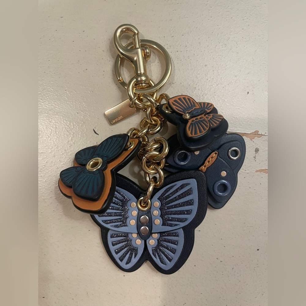 Coach butterfly charm